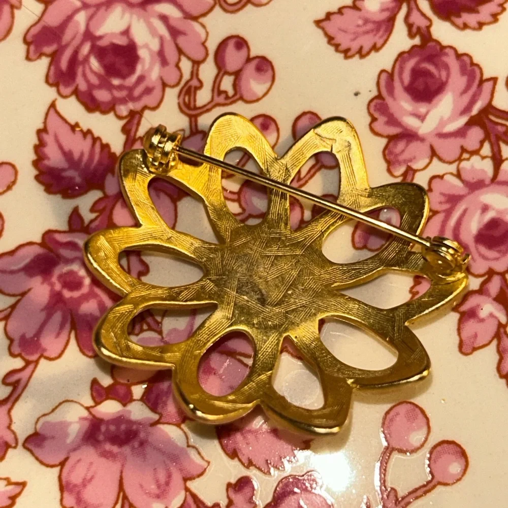Elegant Gold Flower Brooch with Pearl Center